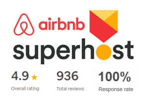 Badge: Airbnb Superhost, 100% response rate, 4.9 stars overall, 936 verified guest reviews